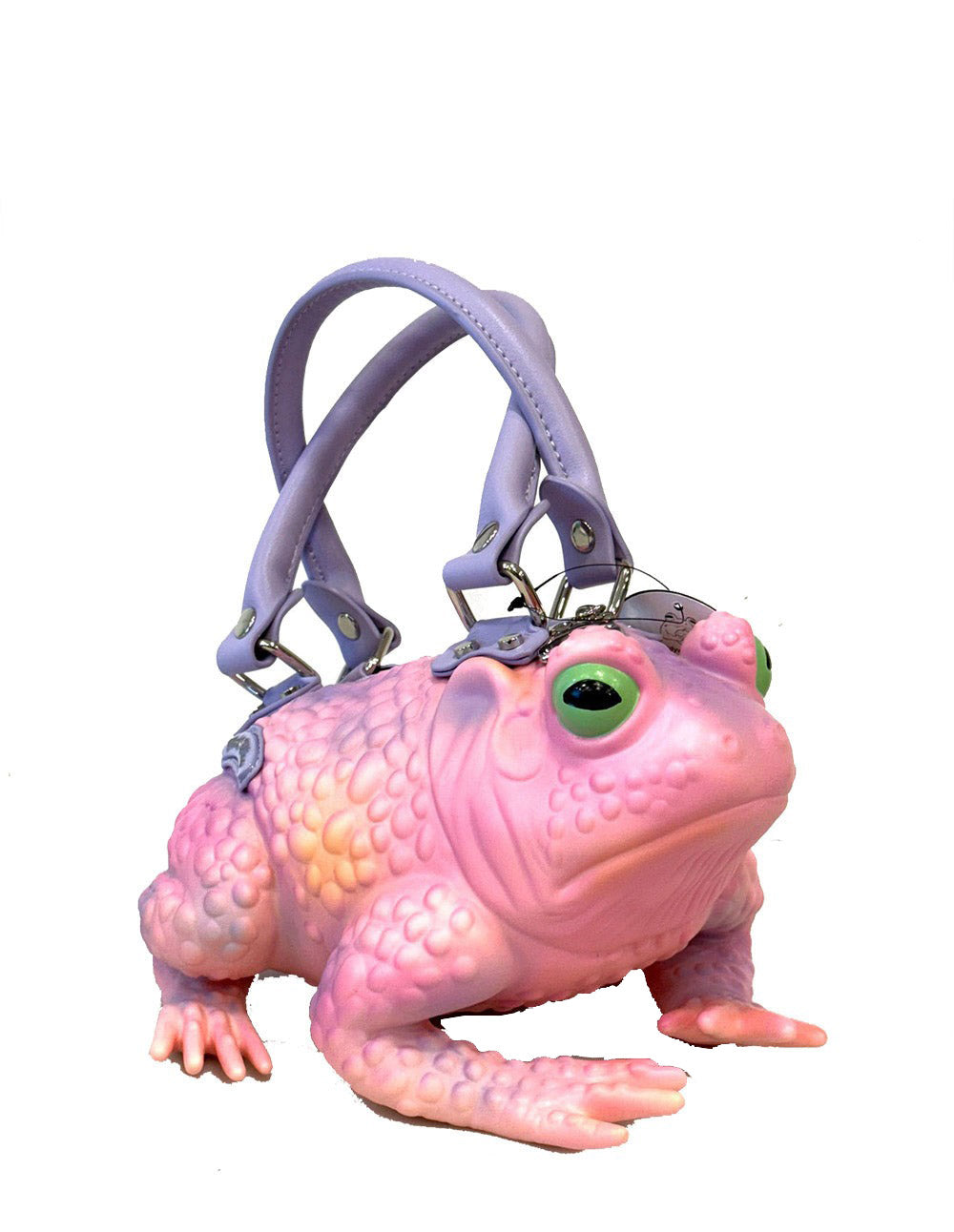 Pink frog-shaped crossbody bag with a strap on a white background