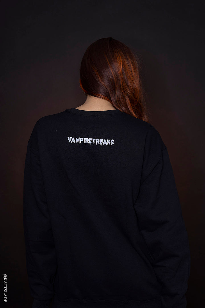 pastel goth sweatshirt with vampirefreaks branding on the back