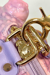 weird toad handbag with gold hardware 