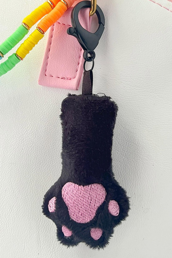 kawaii Black cat paw-shaped keychain with pink details 