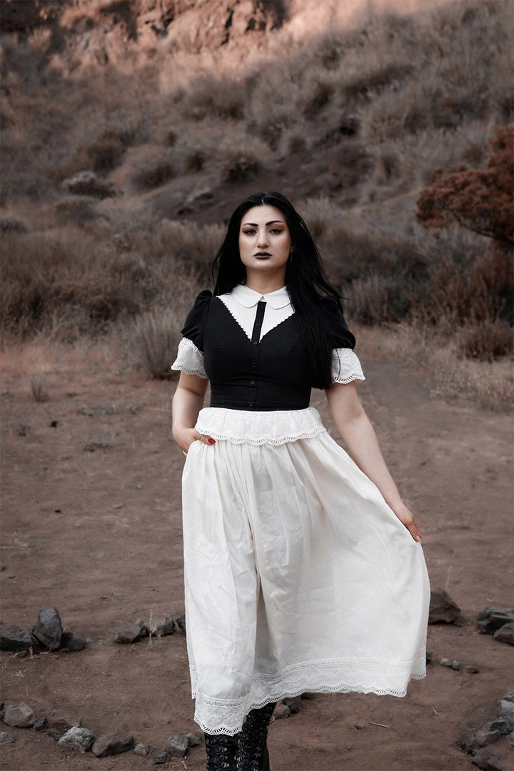 peplum hem dress by lively ghosts 