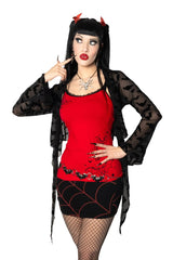 Woman in a red and black pin up girl tank top with a white background