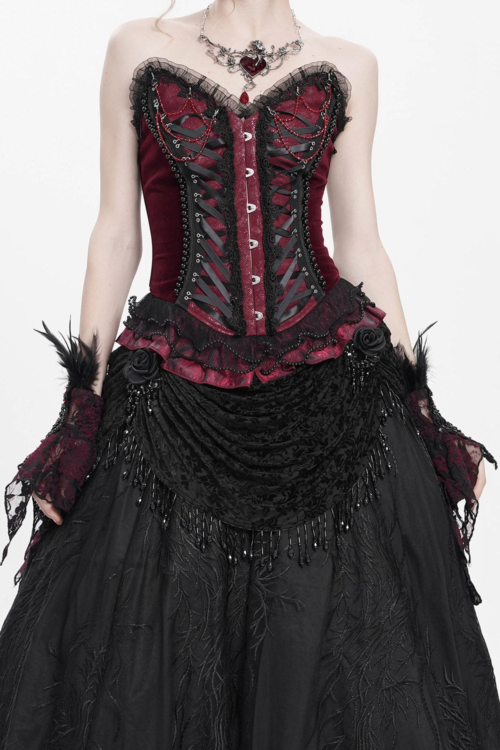womens romantic goth lace-up top with ruffle hem