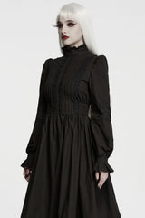cinched waist long black dress with ruffle detail
