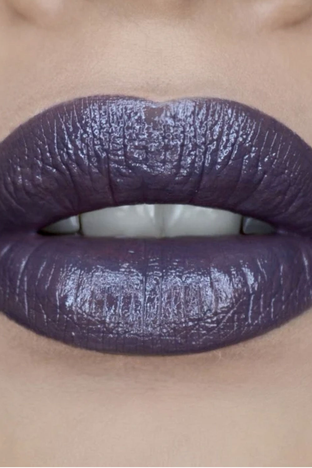 Deep muddy brown purple lipstick with creamy satin finish for goth punk emo makeup and edgy alternative beauty looks