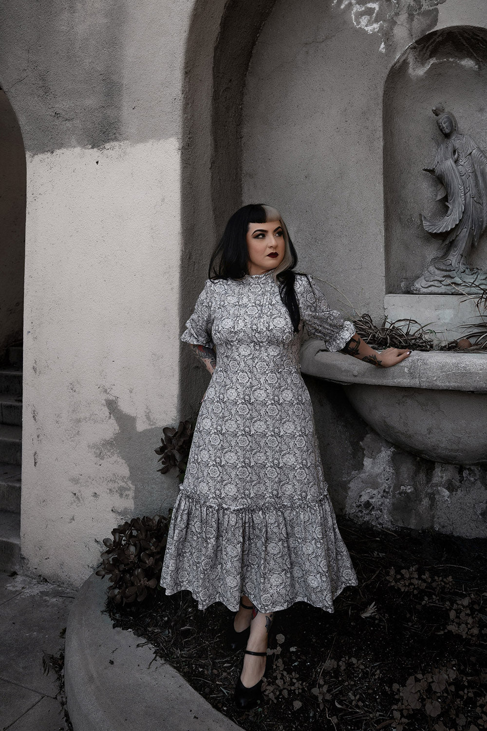 puffed sleeve high collar ruffle dress by lively ghosts  with pockets 