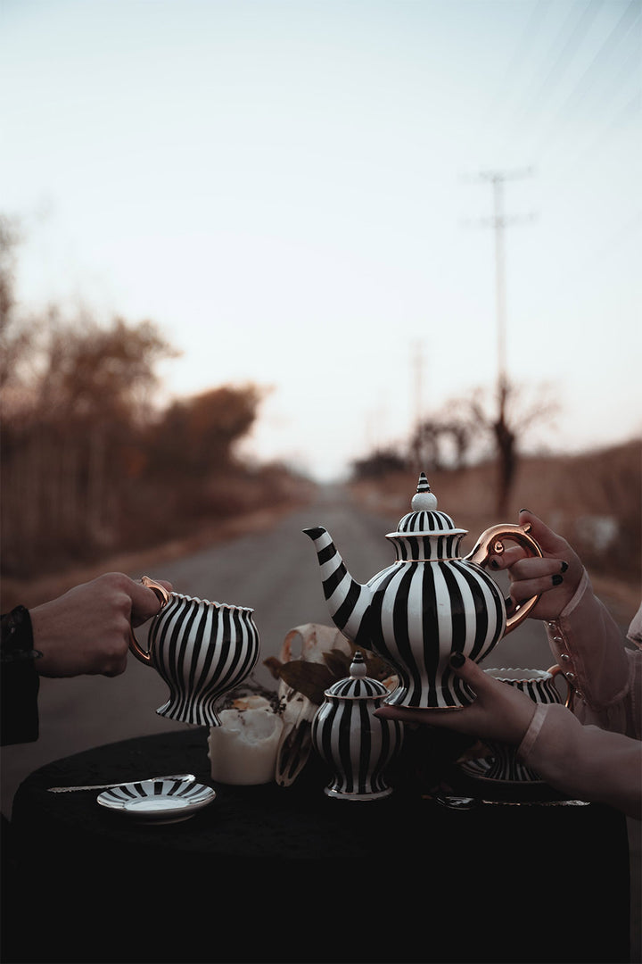 spooky teapot and gothic teacups 