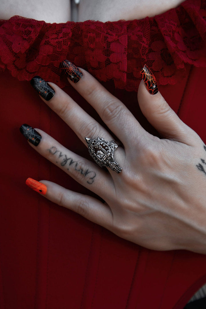 ornate gothic middle finger rings