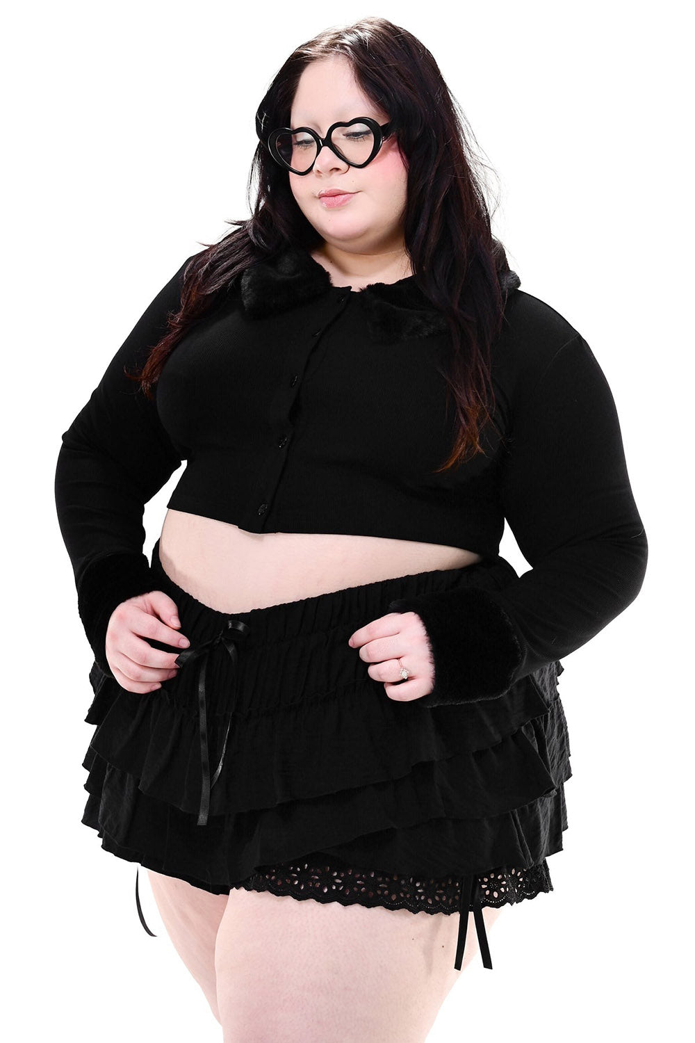 plus size Black ruffled bloomer shorts with a cardigan on a white background
