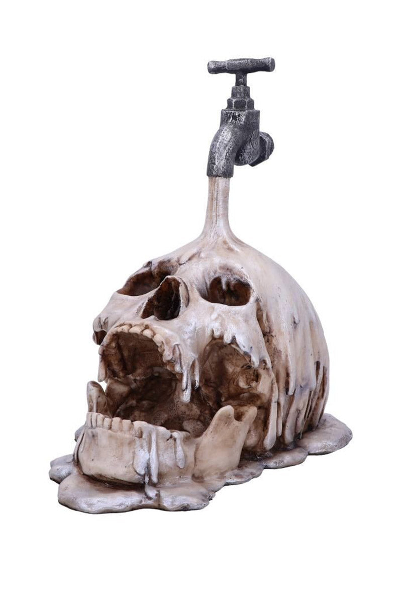 Tapped Melting Skull Statue