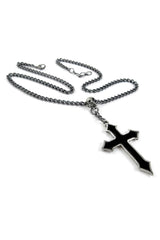 Black cross pendant on a chain against a white background
