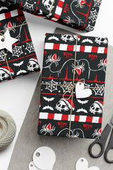 spooky xmas skull, spider, goth santa claus hat, bat, and web christmas wrapping paper