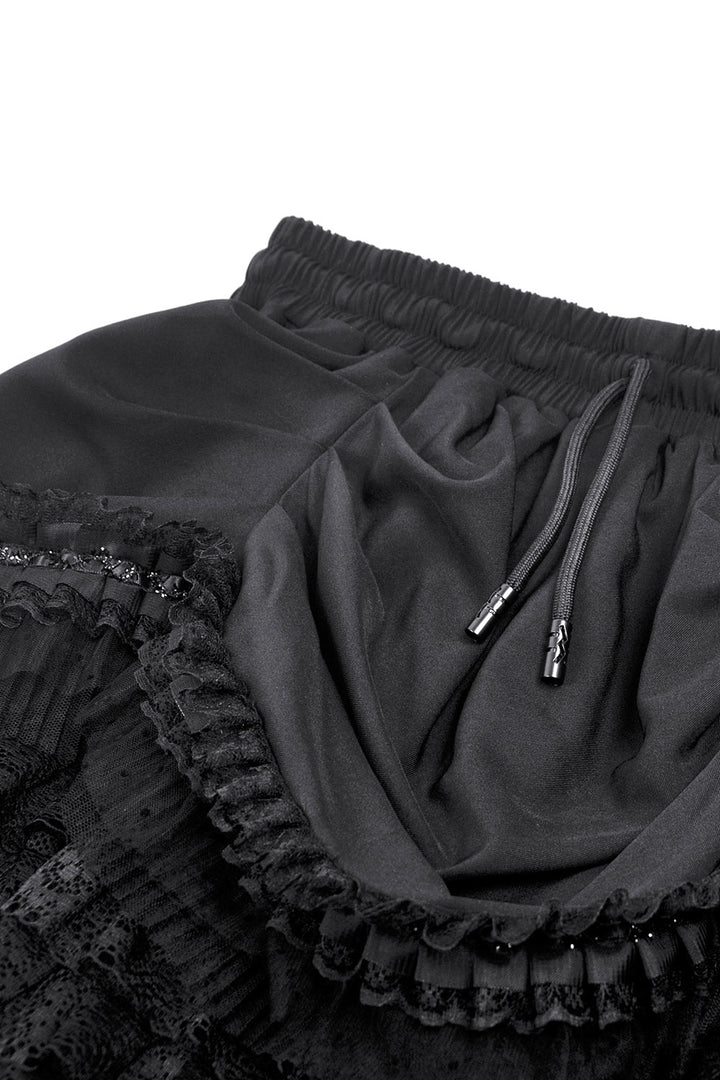 short stretchy layered ruffled skirt with attached train in the back with drawstring waist 