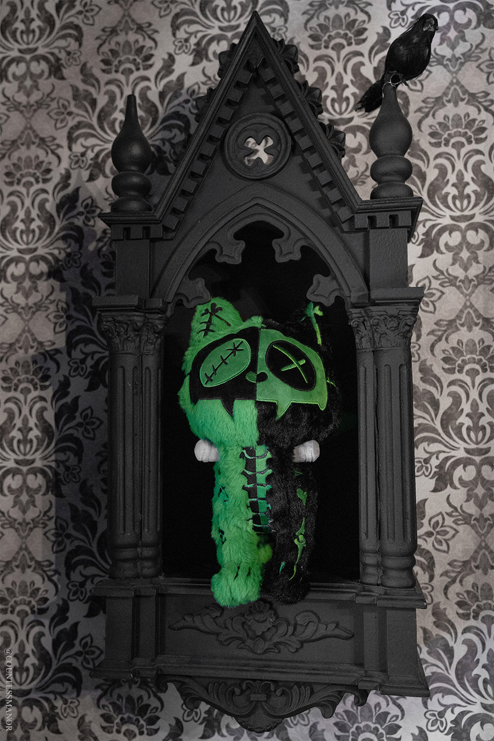 green and black frankenstein cat parody plush toy with monster neck bolts