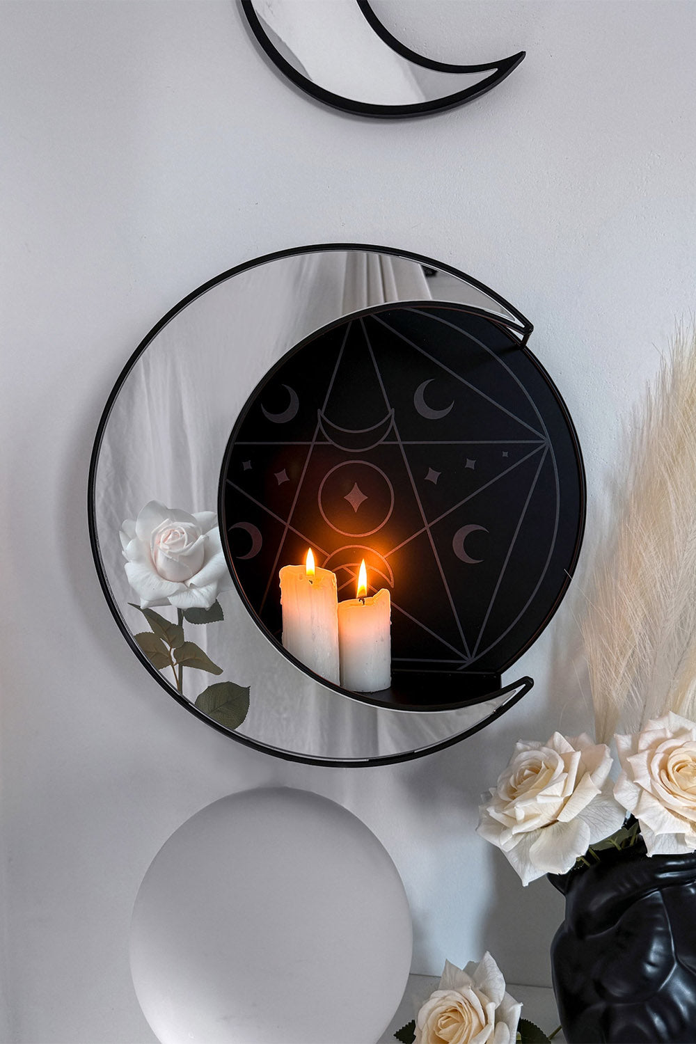 large gothic wall shelf shaped like a moon
