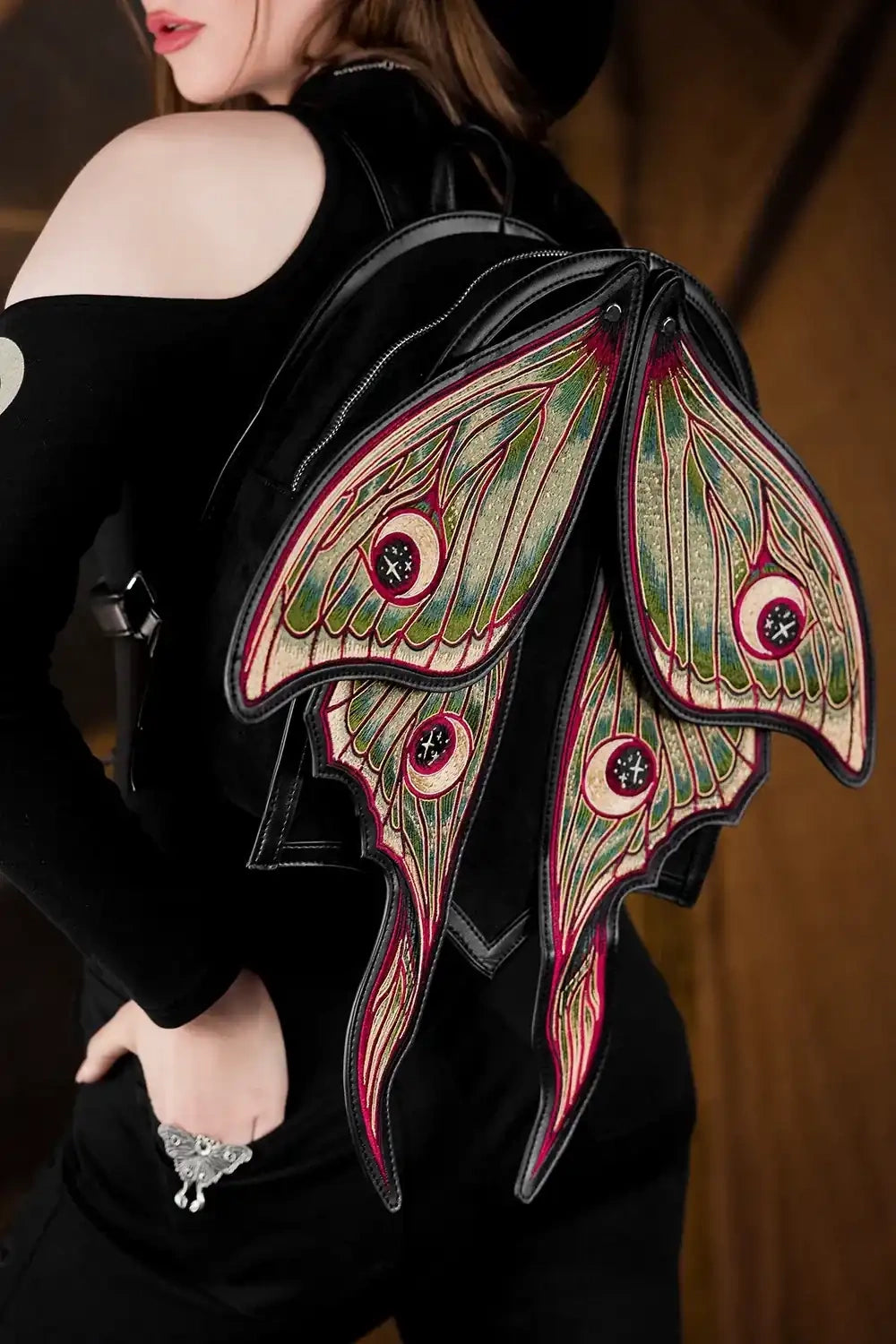 backpack with attached wings
