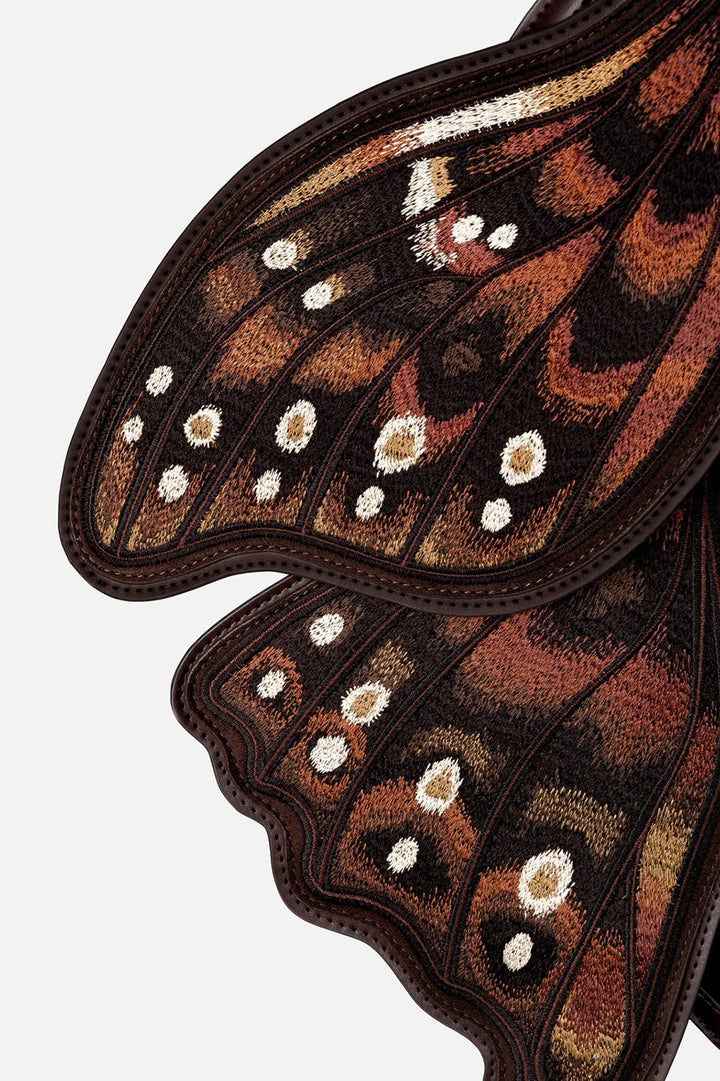 whimsical embroidered moth wings backpack by restyle 