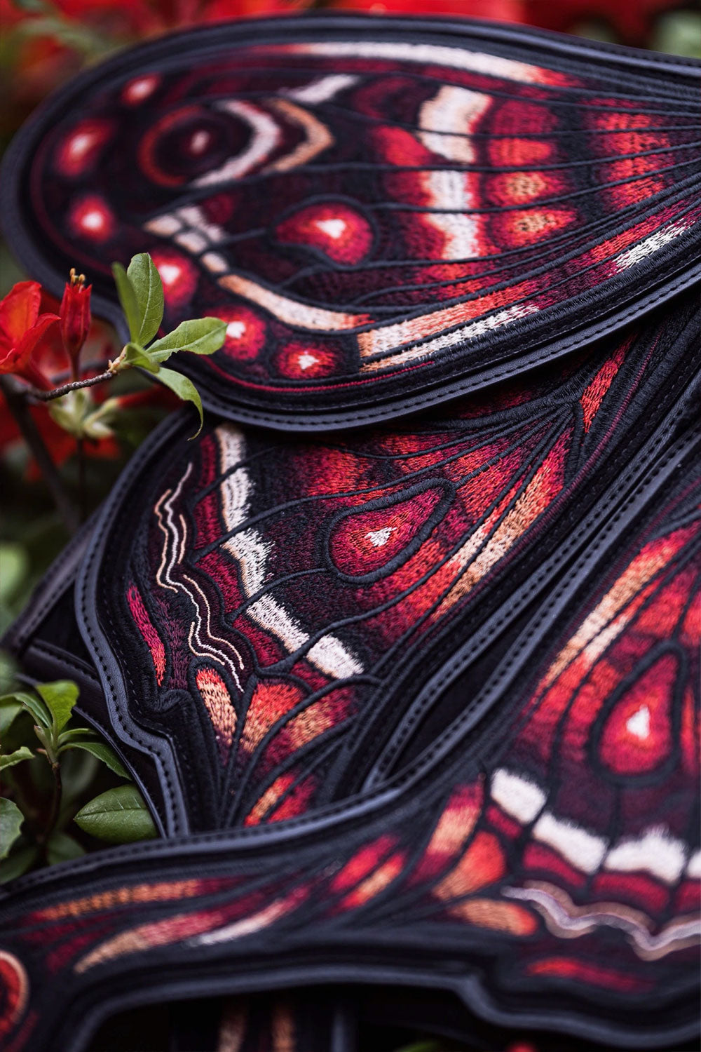 crimson, burgundy, and black luna moth backpack
