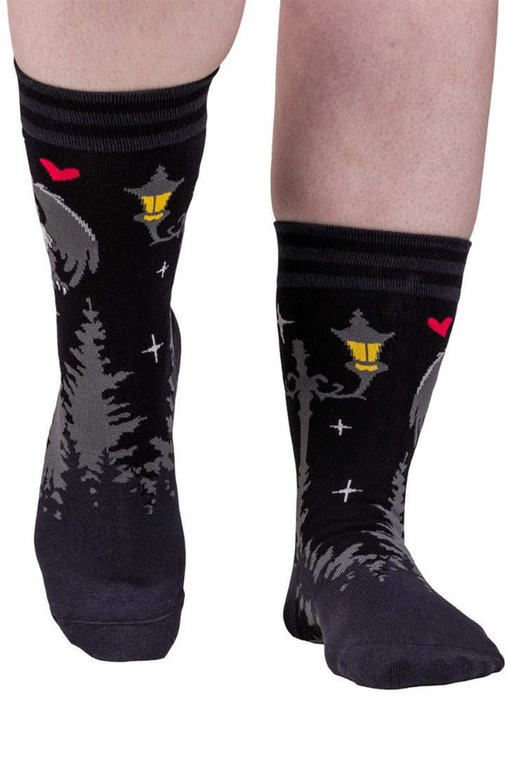 creepy cute knitted mothman socks by footclothes