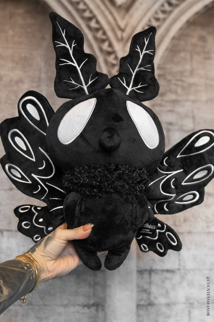 big black and white mothman stuffed animal plush toy with big wings