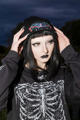 Soft black gothic winter beanie with enchanted luna moth artwork for dark academia witchcore and occult inspired accessories