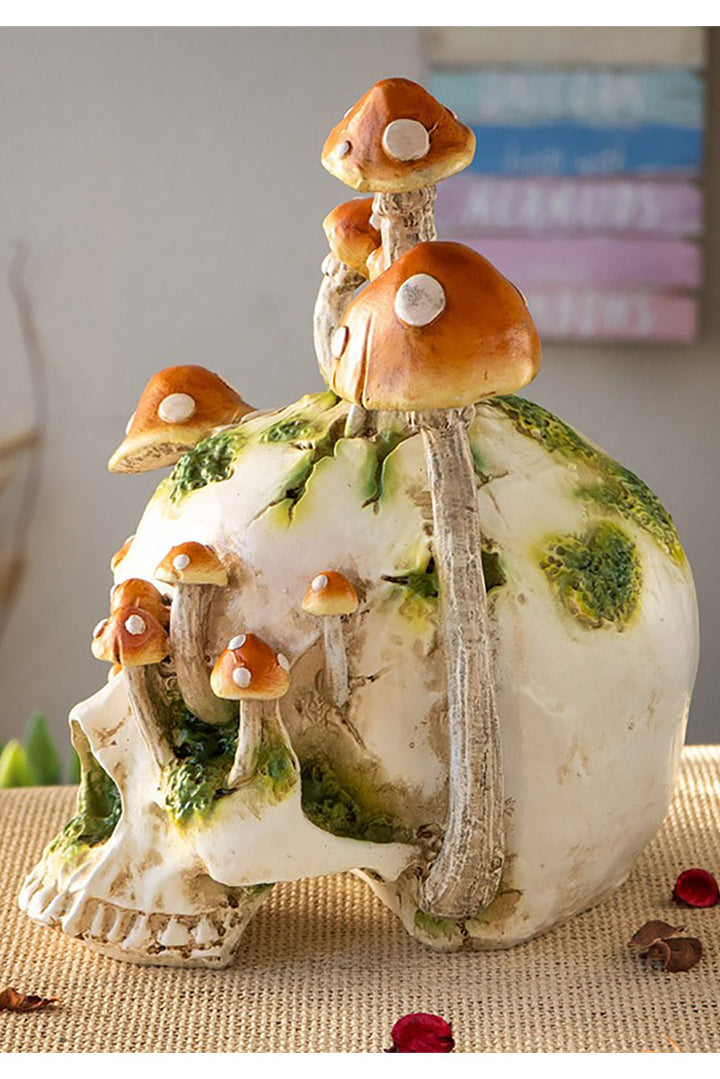 witchy skull overgrown with moss and mushroom statue decoration