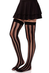 Black fishnet stockings with brown stripes worn by a person on a white background