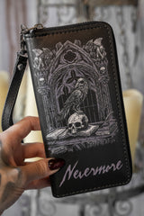 Black vegan leather wallet with gothic design and 'Nevermore' text held by a hand.