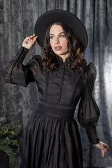 puff shoulder woman in black gothic dress by witchwood bags