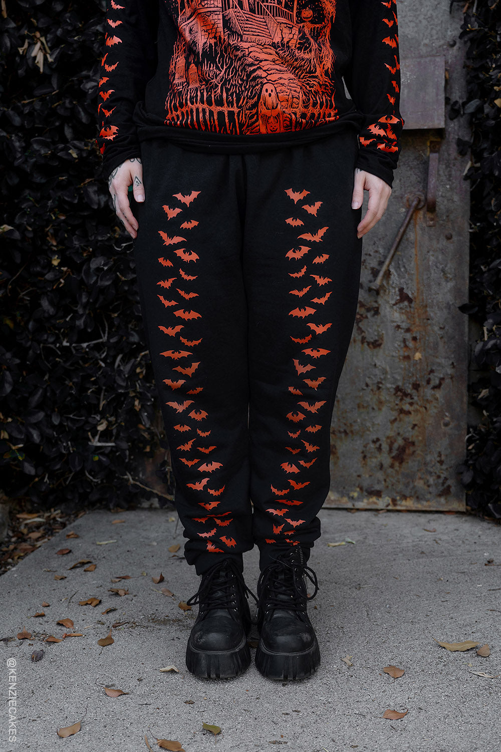 orange and black goth joggers