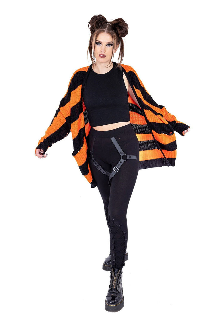 studded orange and black cardigan with pockets