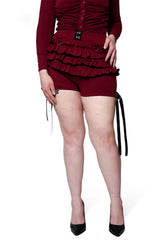 Deep red bloomers with elasticated waist and legs, faux garter details, and picot trim on the waist