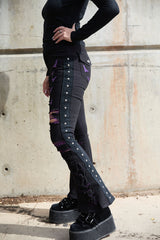punk black pants with metal pyramid studs down side of legs