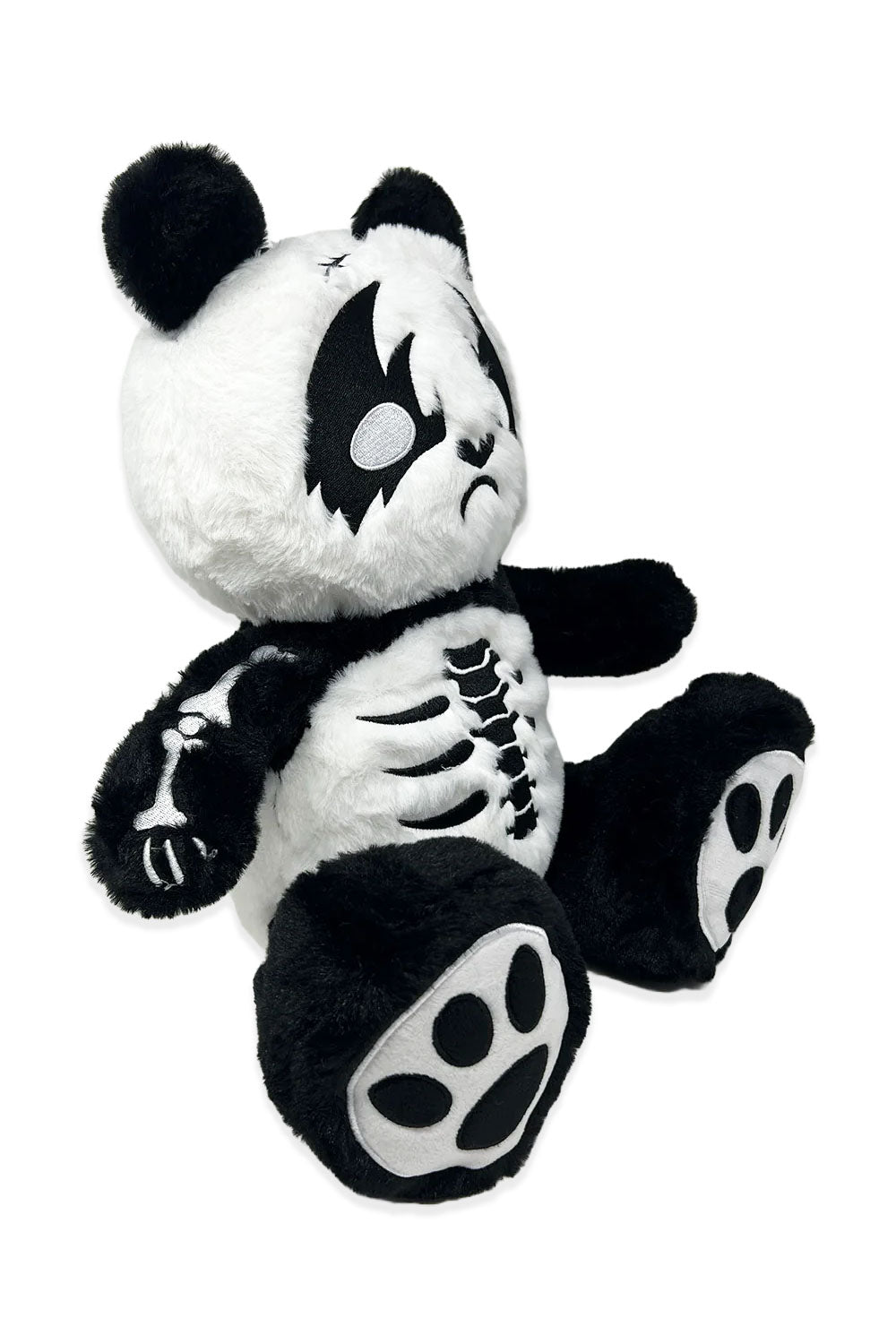 Plush panda bear with skeleton embroidery detail