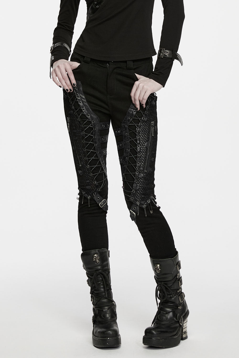 goth grunge black pants with eyelet lace-up panels on thighs form bold punk decorative details