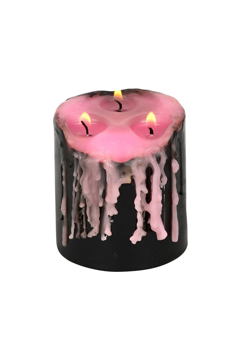 pretty pastel pink and black bleeding wax candle 