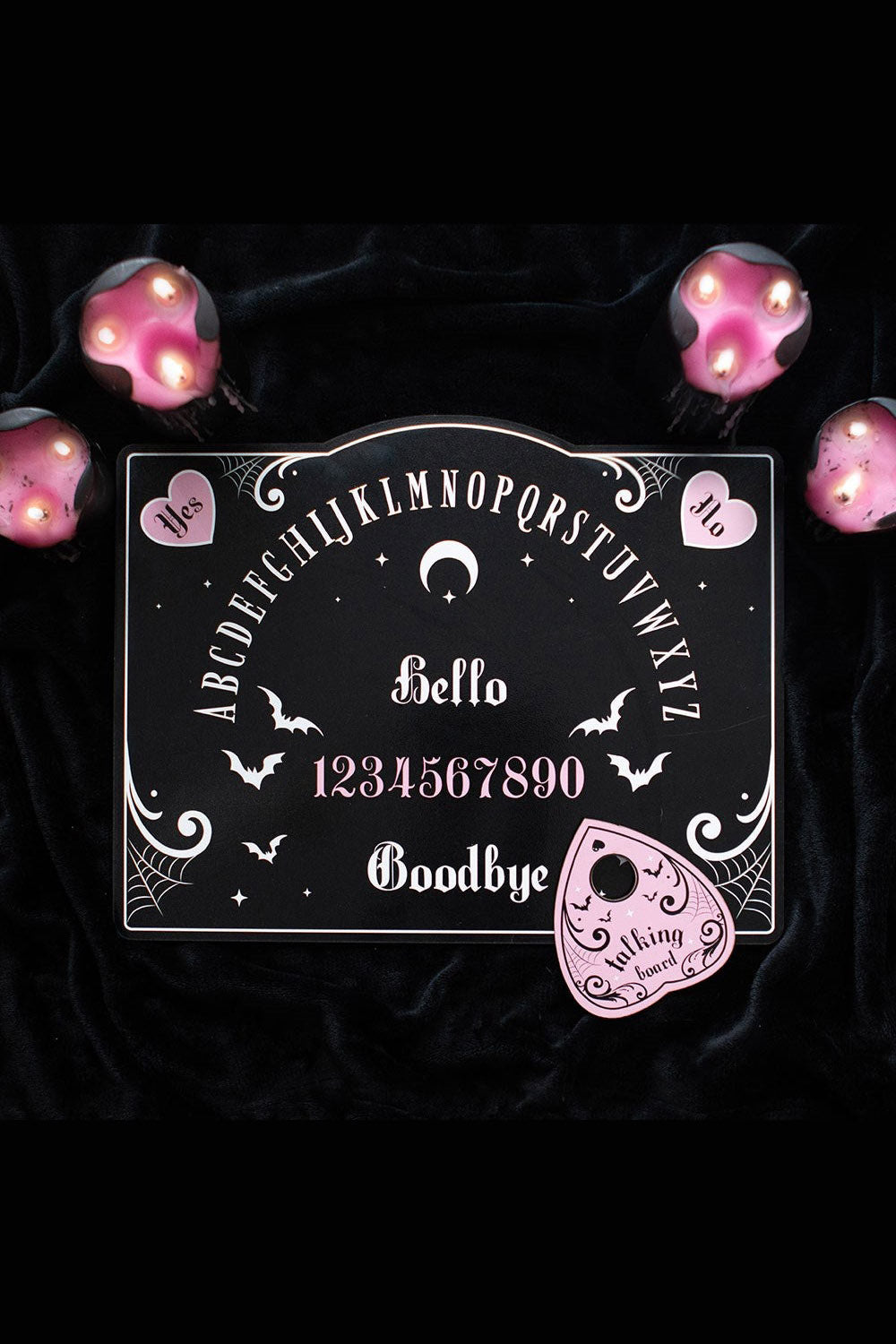 pastel goth ouija board with heart planchette 