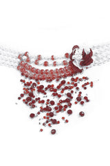 flower and fake blood necklace