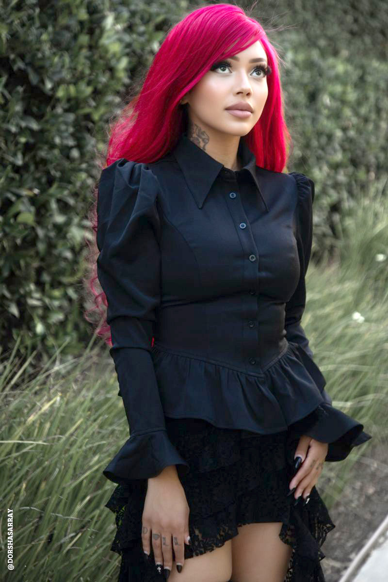 peplum top with pointed collar