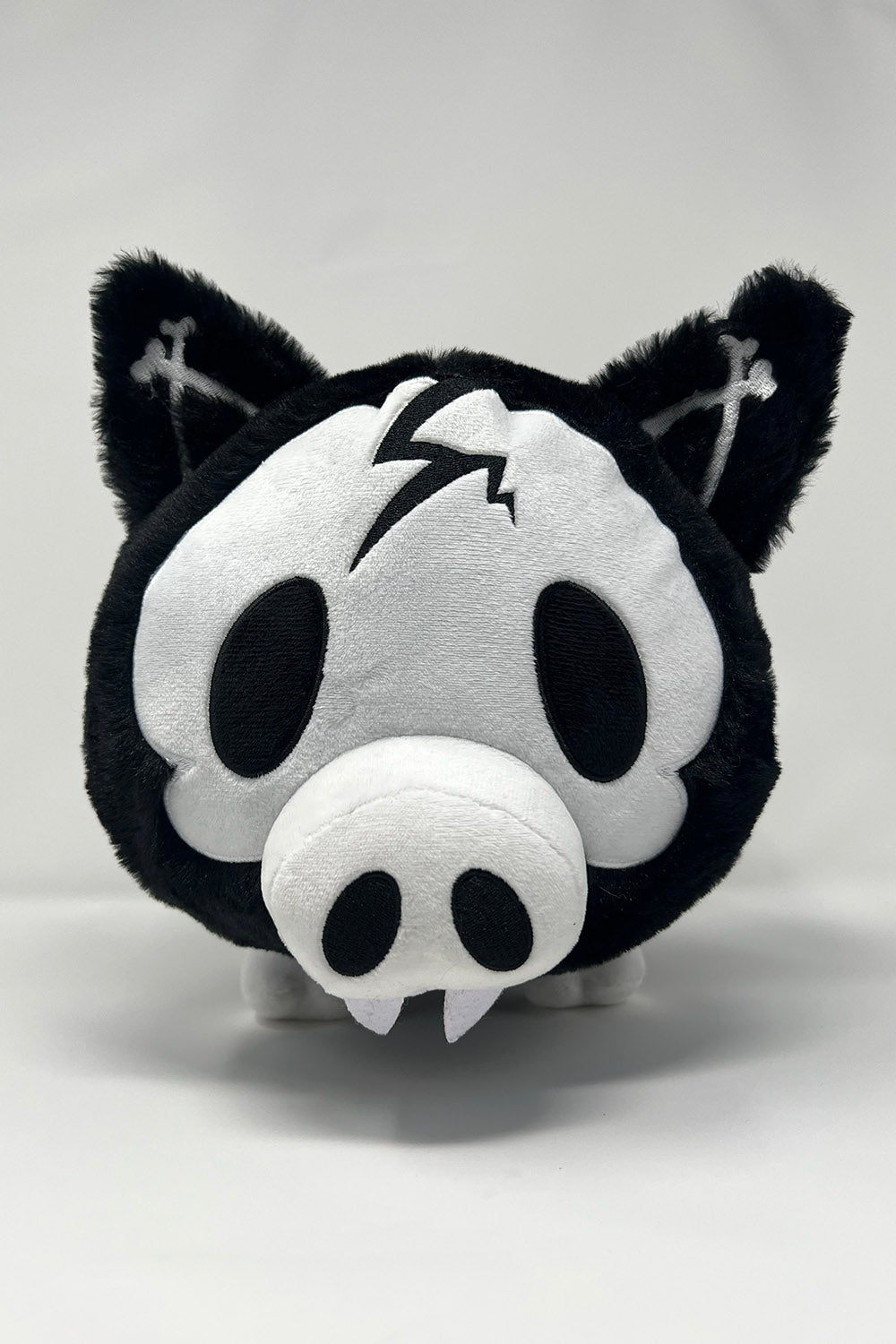 emo black and white stuffed animal skeleton plushie with spiral tail