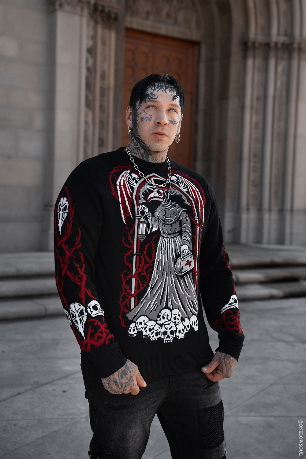 plague doctor knitted jumper for men and women with spooky alternative artwork for goth grunge and punk wardrobes