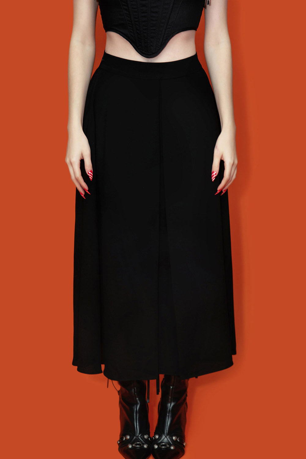 high-waisted black midi length skirt