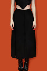 high-waisted black midi length skirt