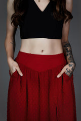 flowy red high-waisted skirt