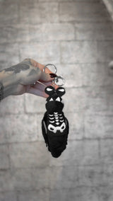 video of a gothic insect bug slug keychain