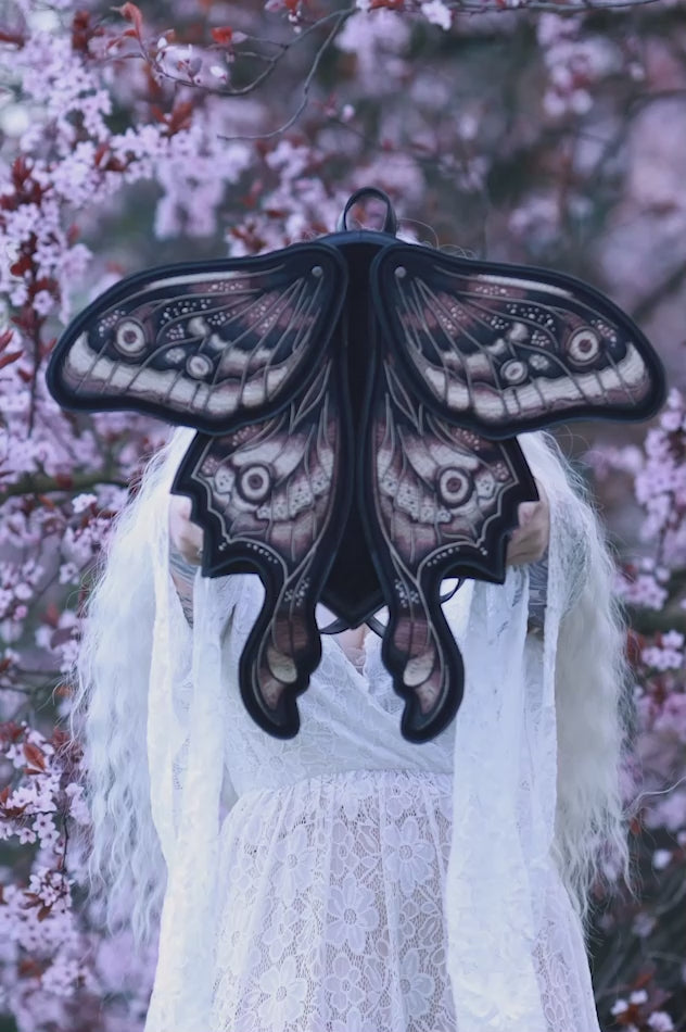 Video of model wearing brown moth bag from Restyle