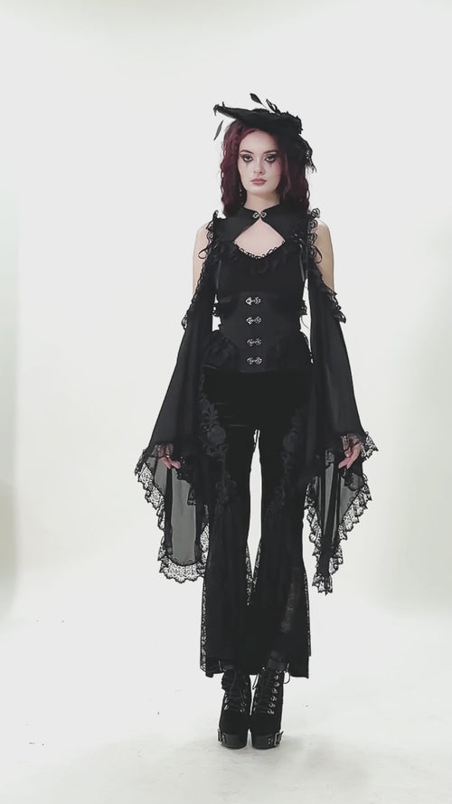 video of a gothic woman wearing a pair of romantic goth black velvet pants