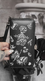 video of an alice in wonderland wallet