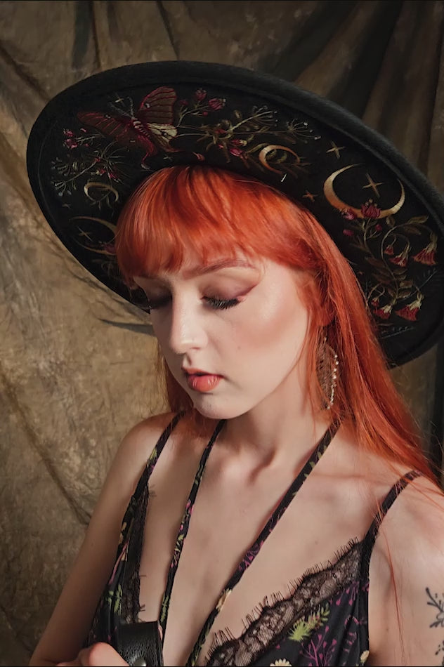 video got gothic girl wearing dark fantasy hat