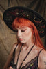 video got gothic girl wearing dark fantasy hat